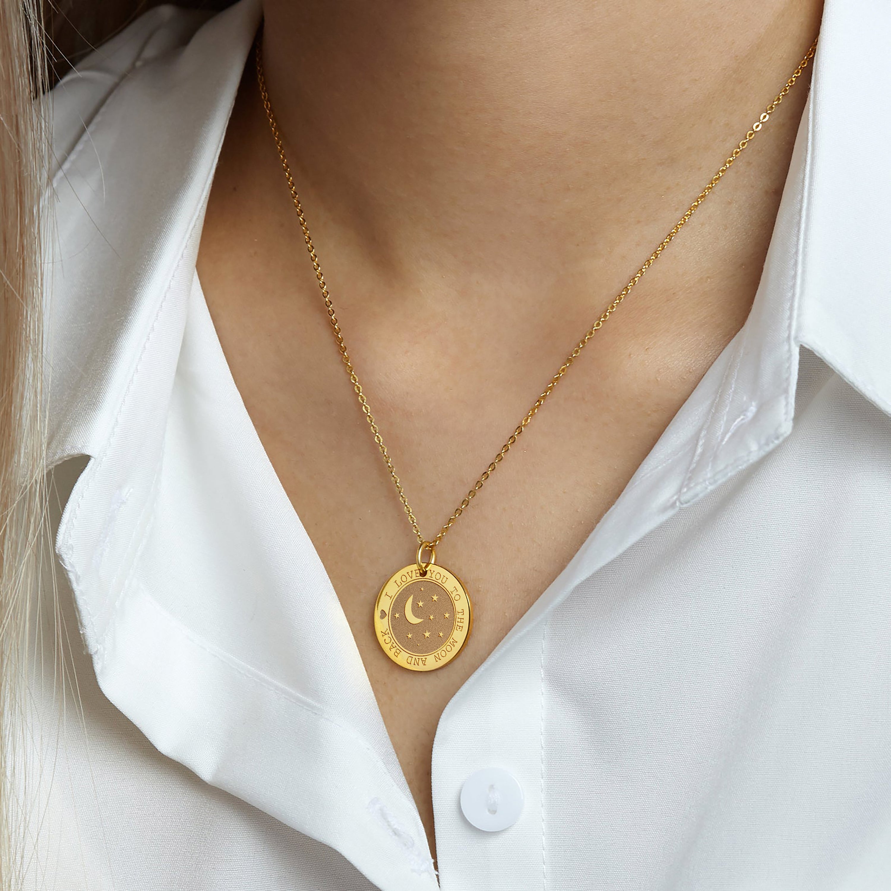 a close up of a person wearing a necklace